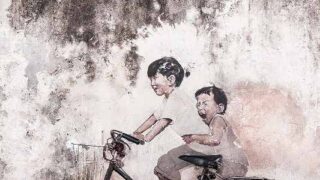 少年の壁画と自転車